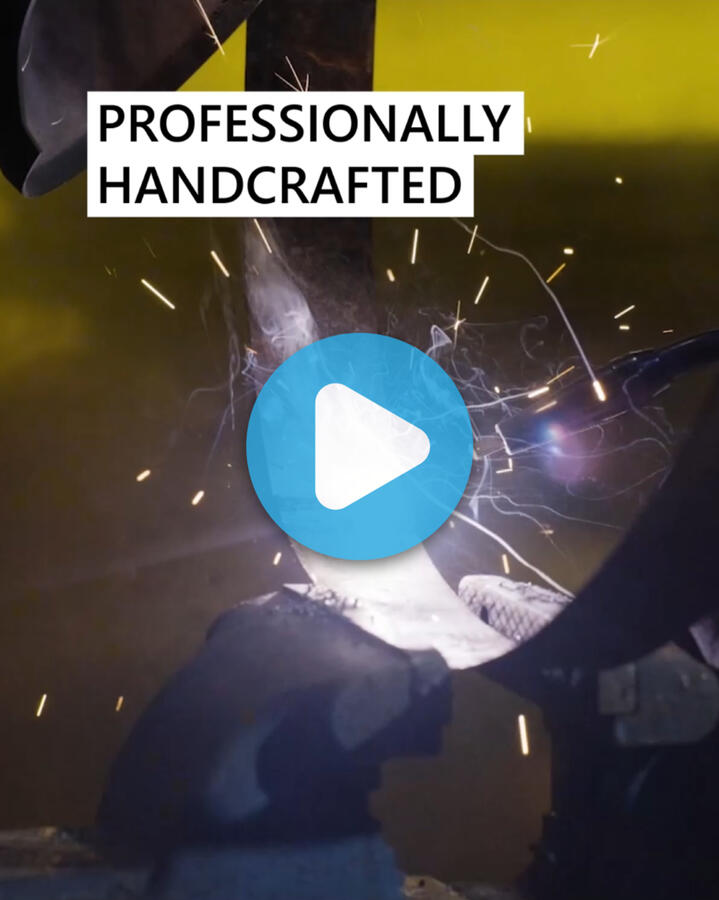 A thumbnail for a video ad on Meta that shows the care and craft that goes into building whiskey barrel furniture for an online furniture store.